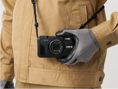 The WG‑6 features three strap eyelets for a choice of two-point strap configurations that the keep the camera out of the way of your work.