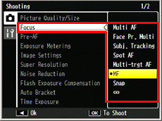 Go to [Focus] > [MF], then press the [ADJ./OK] button.