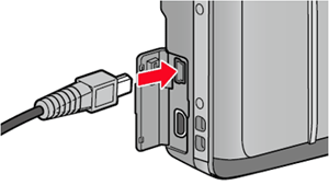 Connect the USB cable to the USB terminal of your camera. Then, your camera automatically turns on and the Connecting PC... message appears.