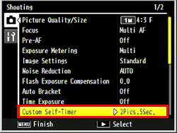3 Press the [ADJ./OK] button down to select [Custom Self-Timer], and press the [ADJ./OK] button to the right.