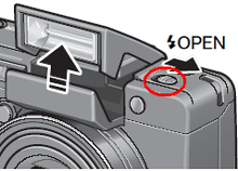 フラッシュボタンを使用するときは OPEN（フラッシュオープン）スイッチを外側にスライドさせてフラッシュカバーを上げます