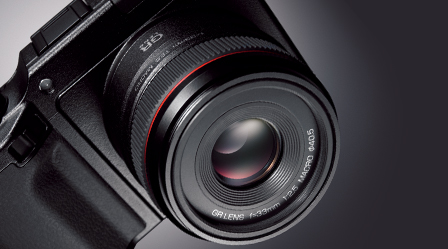 Compact, high-performance lens design enabled by the interchangeable unit system