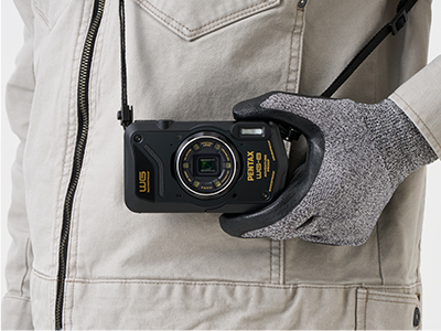 The WG-8/6 features three strap eyelets for a choice of two-point strap configurations that the keep the camera out of the way of your work.