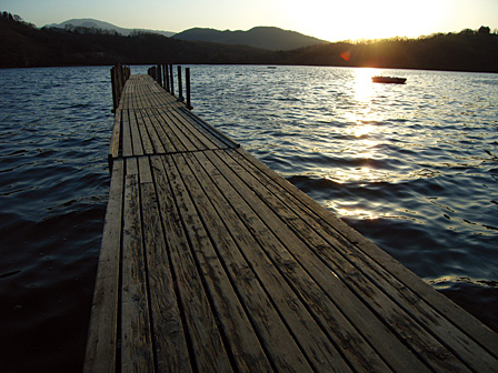 The serenity of this lakeside scene at sunset makes the bustle of daily life feel far away...