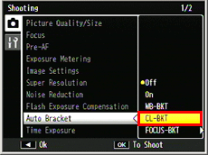 Press the [ADJ./OK] button down to select [Auto Bracket], and press the button to the right.