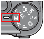 解除ボタンを押しながらモードダイヤルを [マニュアル露光モード] に合わせます