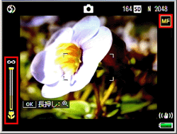 撮影画面に戻り、画像モニターに［ MF ］マークとフォーカスバーが表示されます